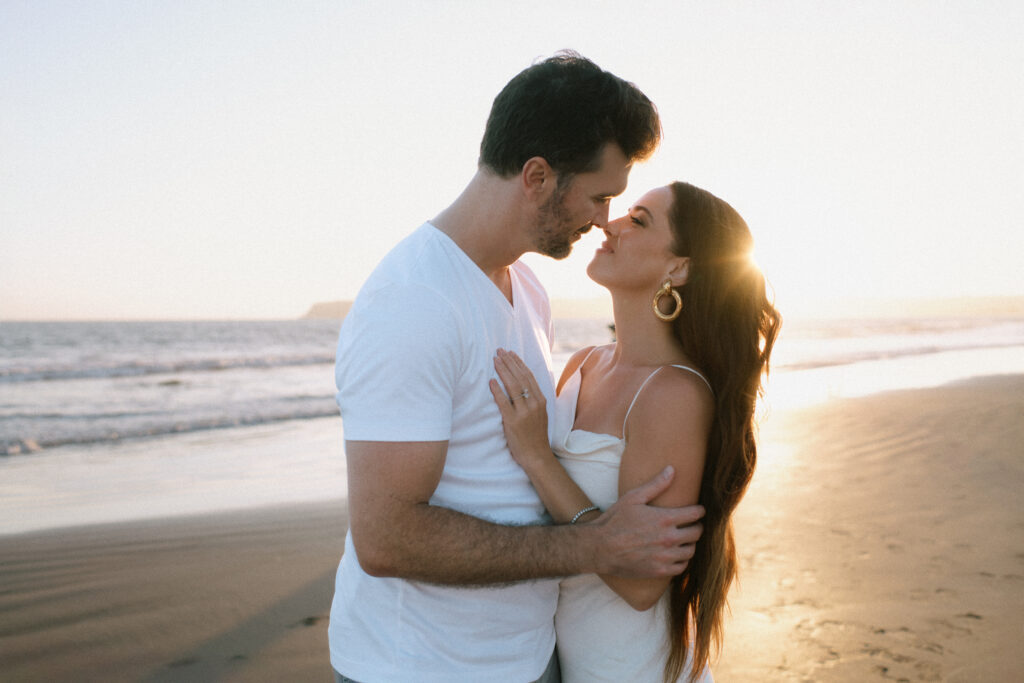 Seattle engagement photographer, golden hour beach engagement session, romantic couple portraits on the Washington coast, candid moments by the ocean, natural light engagement photography, Pacific Northwest love story