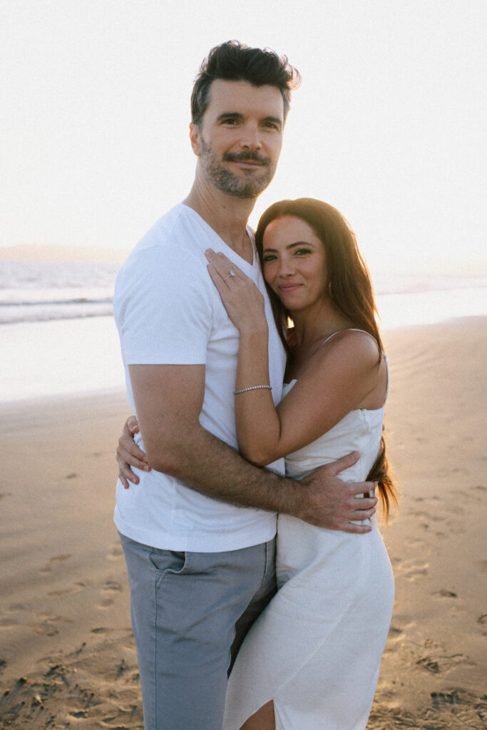 Sunset engagement photos in Seattle, intimate beach session for engaged couple, natural light Pacific Northwest photographer, storytelling engagement images, relaxed engagement shoot by the ocean, candid beach portraits WA
